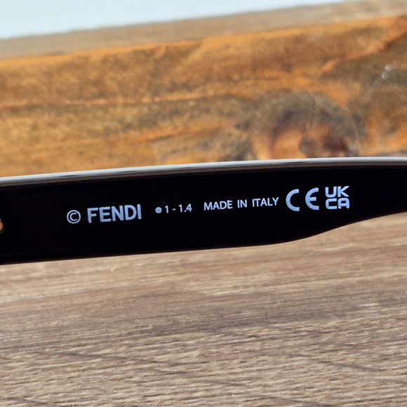 Fendi Black Sunglasses with Gold Accent - Picture 7 of 10